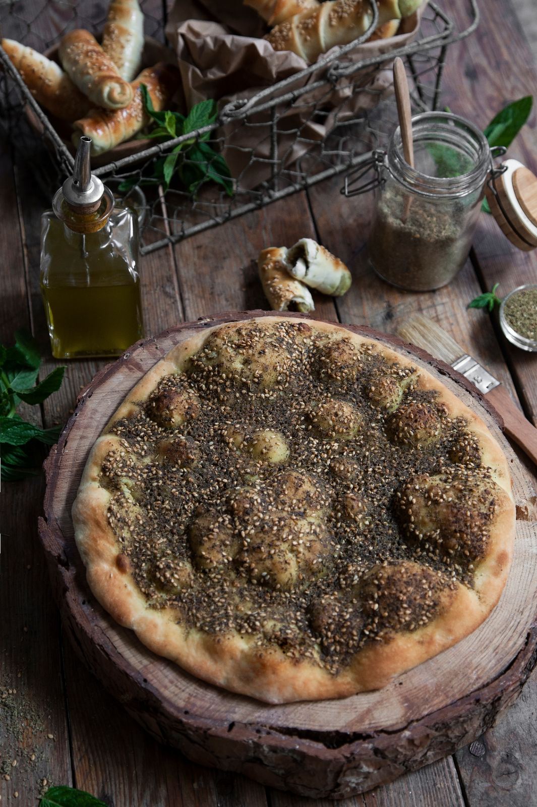 Whole zaatar manoushe with olive oil and sesame