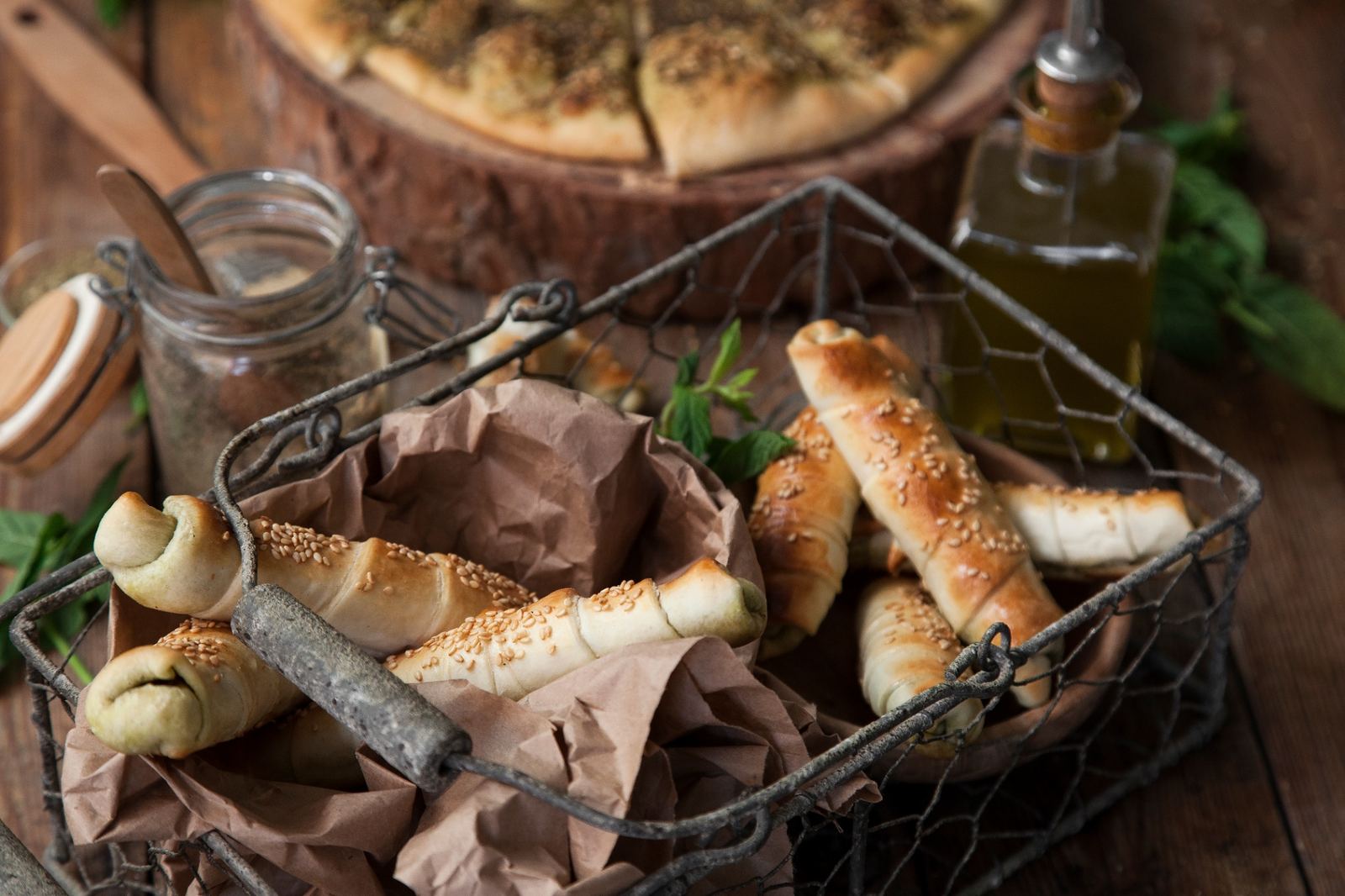 Basket of cheese rolls with olive oil