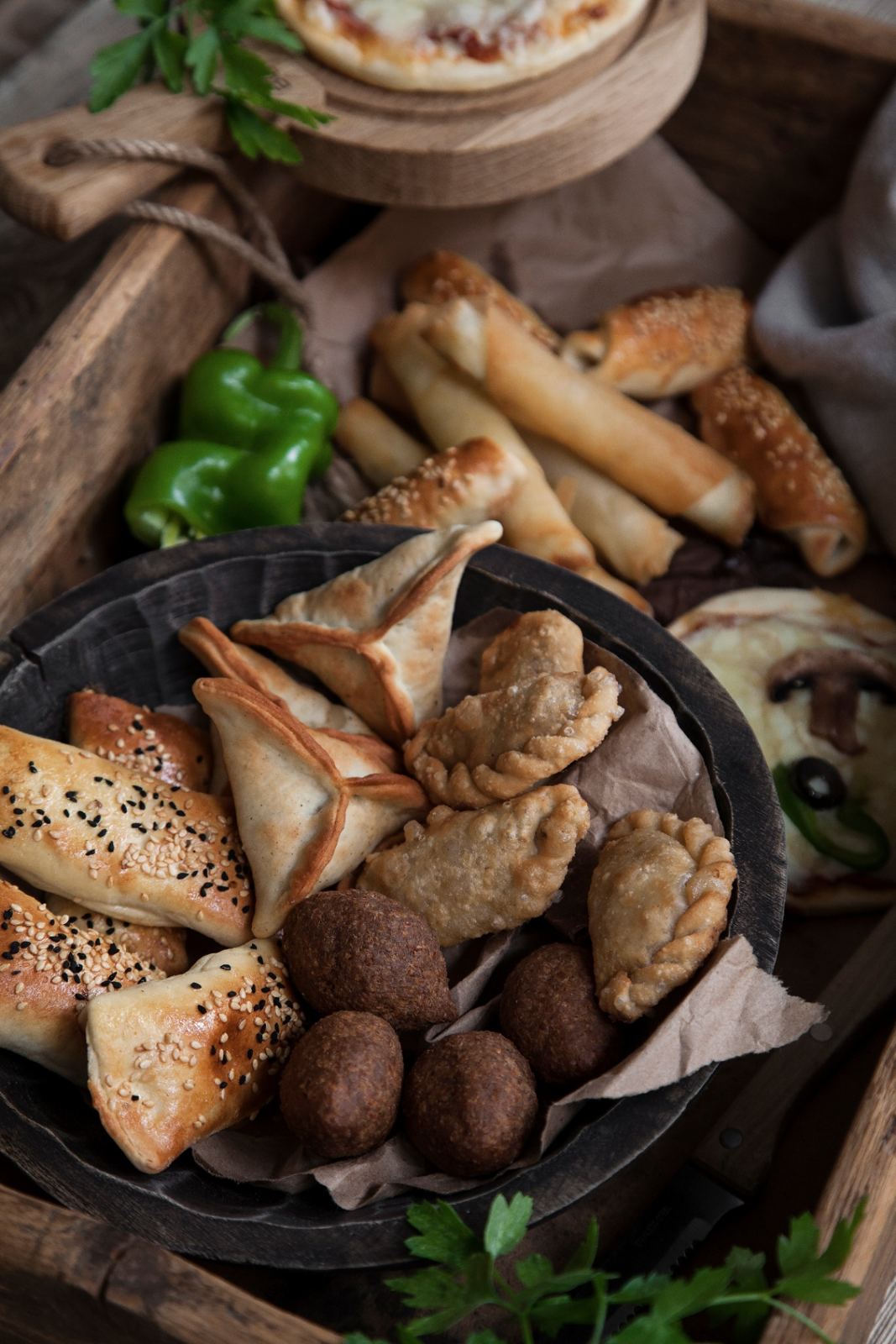 Cocktail platter of fatayer, kibbeh and cheese rolls
