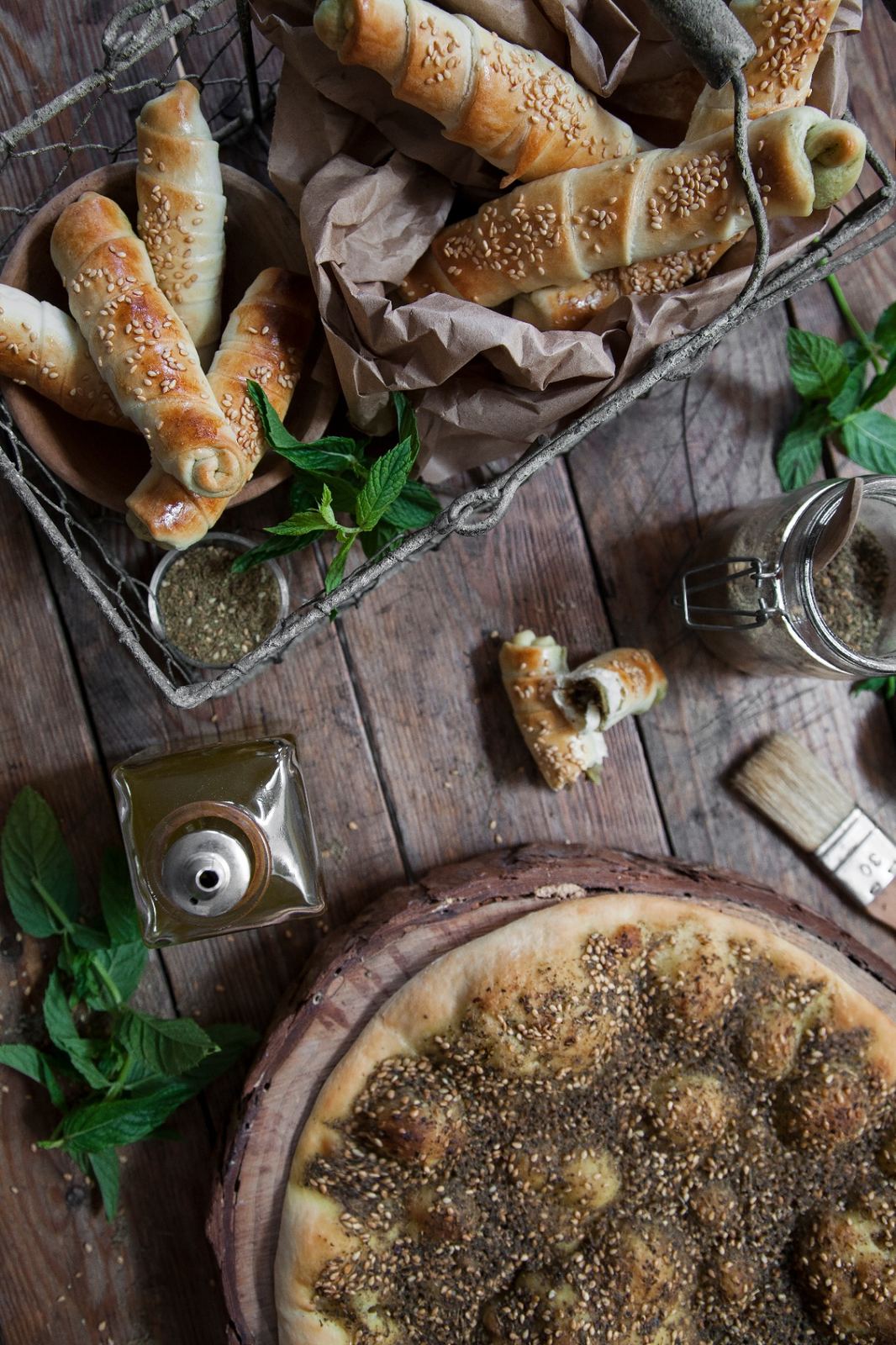 Sesame cheese rolls in a wire basket
